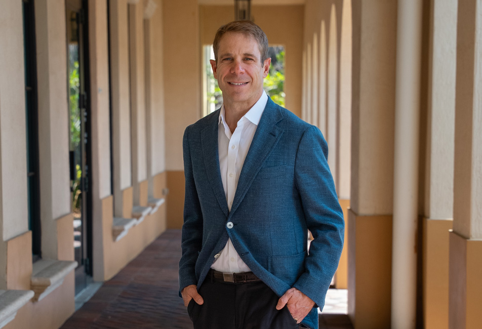 Dr. Jason Cooper standing outside Jupiter, FL plastic surgery practice